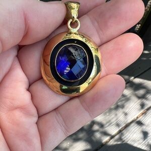 Alchemia Gold Pendant with faceted deep blue/purple stone